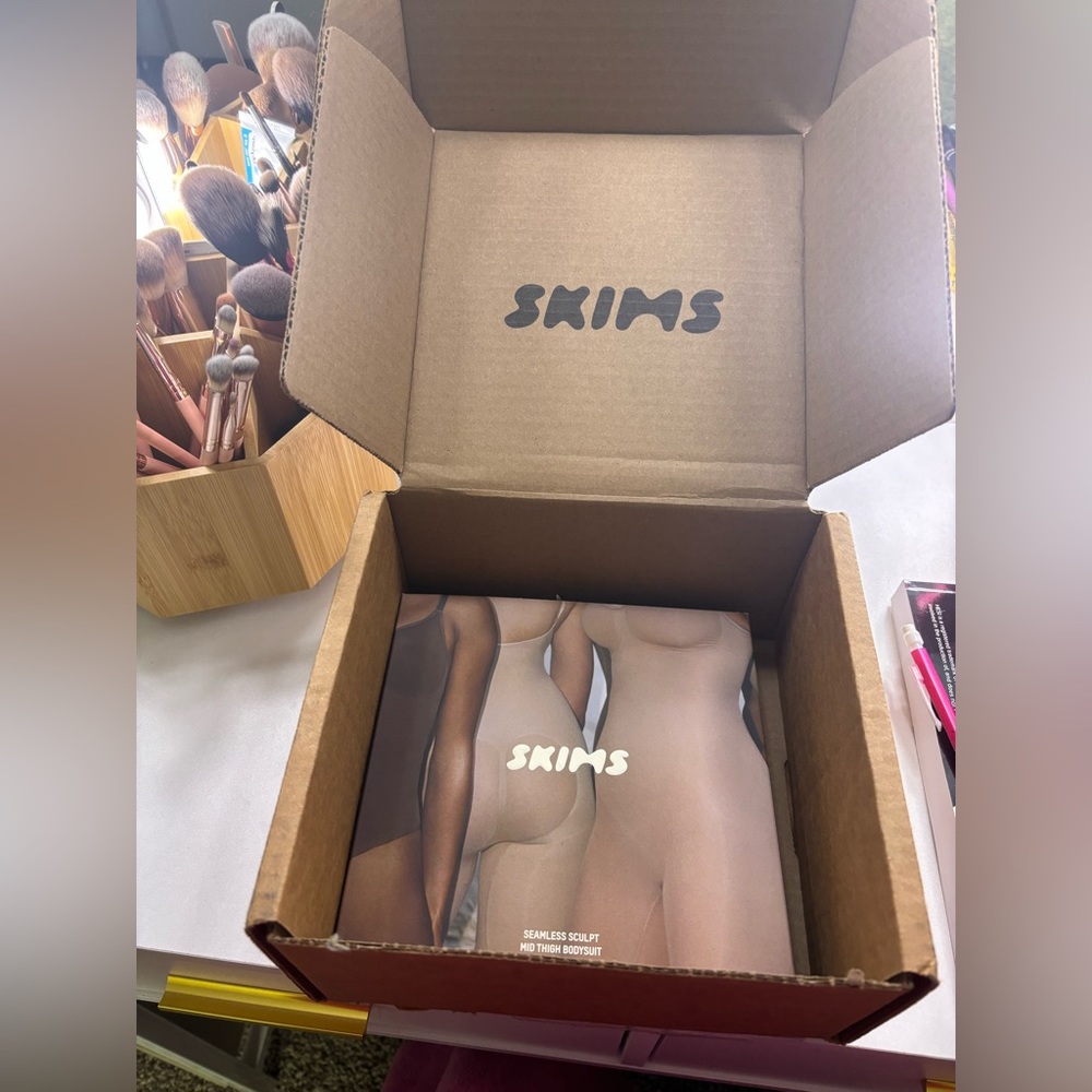 Skims mid thigh bodysuit